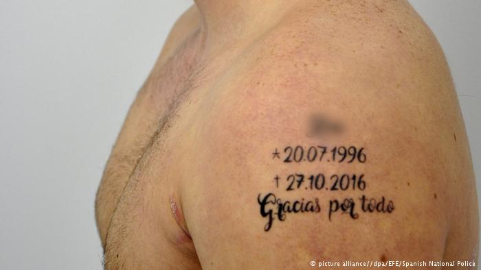 Spanish police detain German murder suspect with `macabre` tattoo